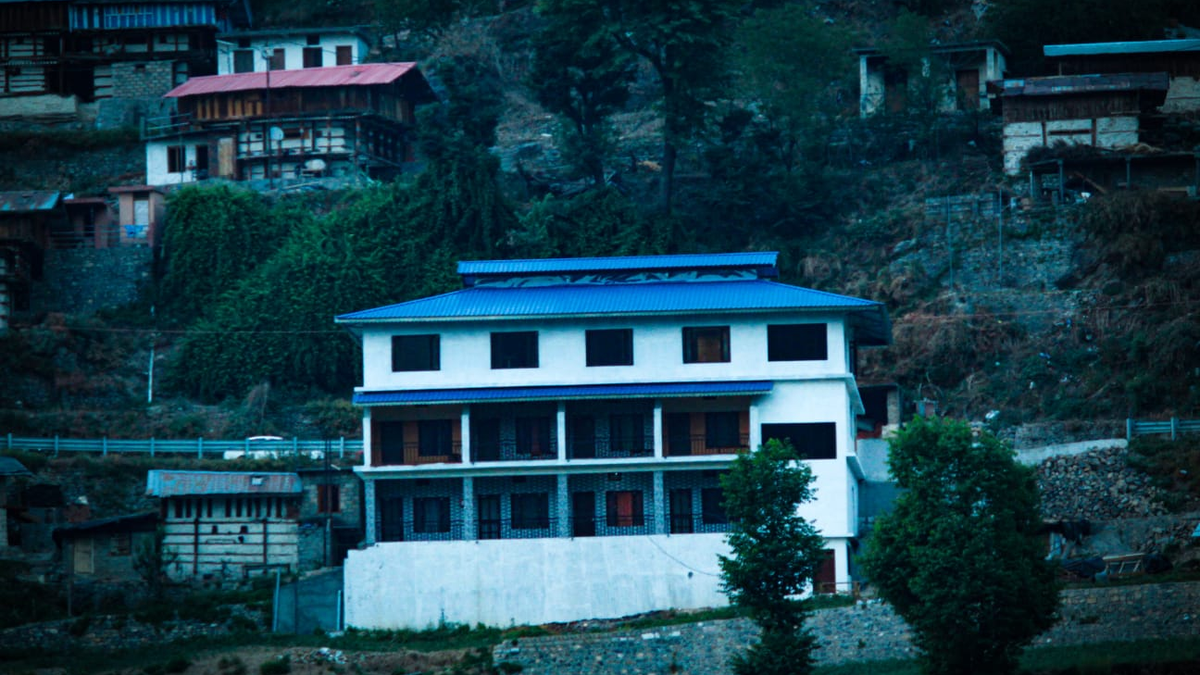 Stone-Paved Entrance and Floral Veranda